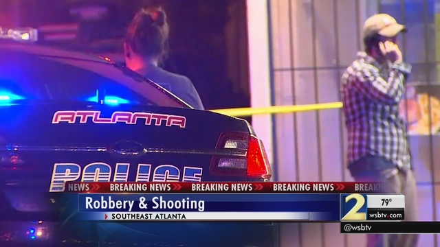 Police: Man, woman shot during robbery | WSB-TV