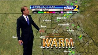 Mostly sunny skies, warm early Tuesday evening